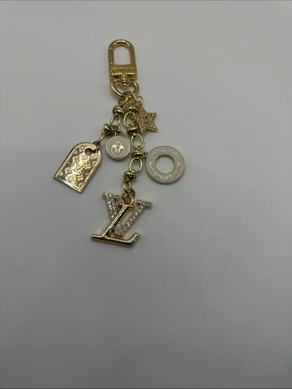 1416. Gold and Ivory Charm Key Holder